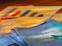 Data and Statistics Photo of printed graphs and statistical data